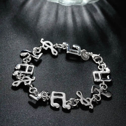 Exquisite Silver Music Note Bracelet - Elegant Jewelry for Music Lovers - Buy Center