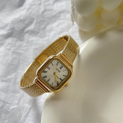 Retro Roman Women's Quartz Watch - Elegant Gold Strap & Slim Design - Buy Center