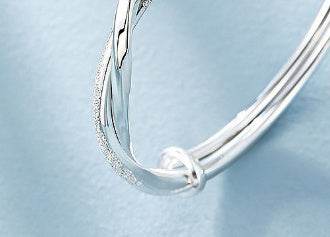 Buycenter Silver-Plated Bracelet - Twist Design with Floral Elements - Buy Center