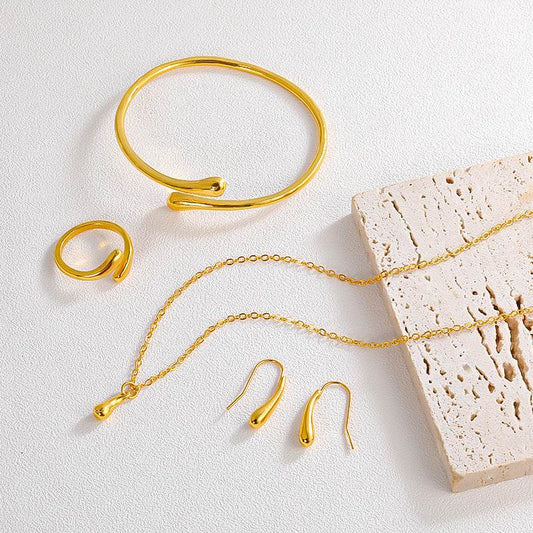 Four-Piece Drop-Shaped Jewelry Set - Necklace, Earrings, Ring & Bracelet - Buy Center