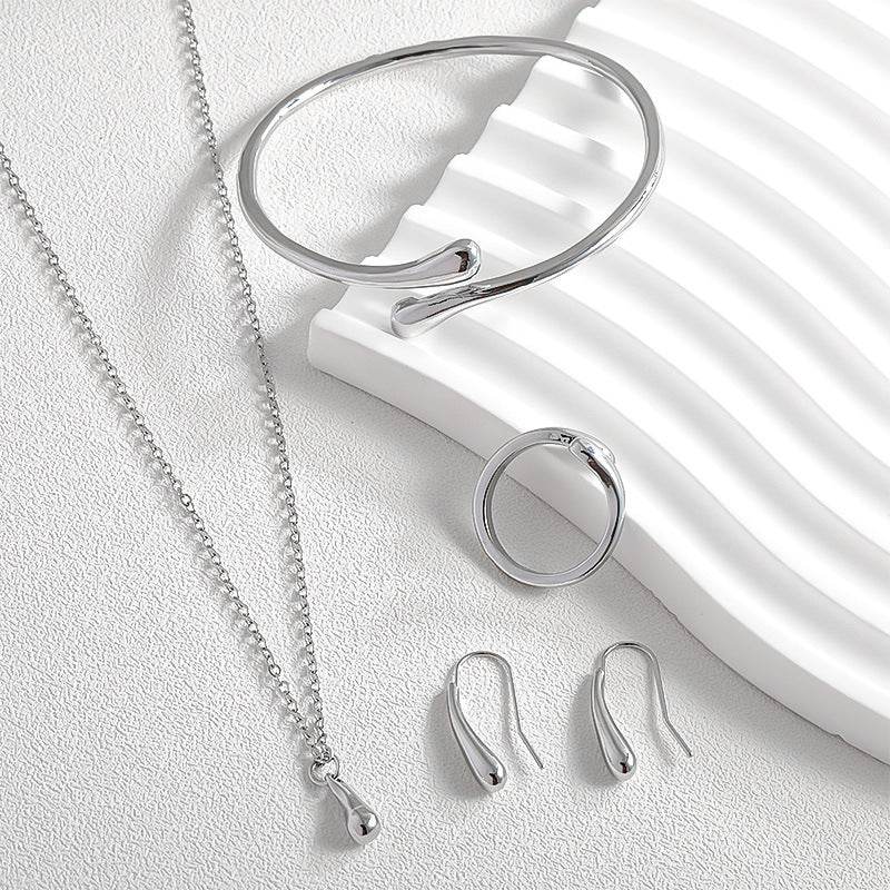 Four-Piece Drop-Shaped Jewelry Set - Necklace, Earrings, Ring & Bracelet - Buy Center