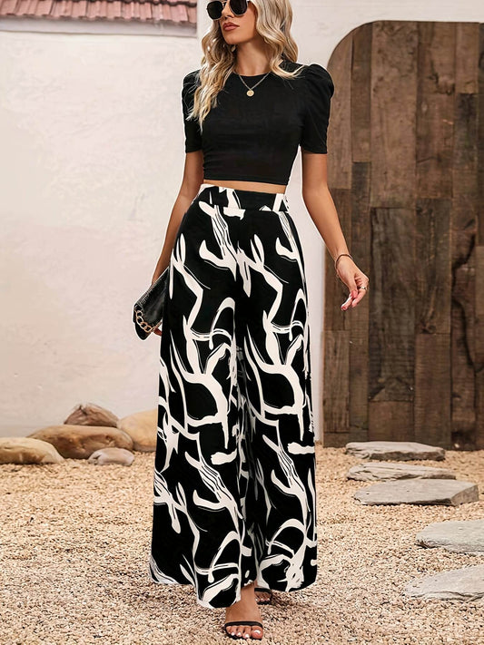 Elegant Women’s 2-Piece Set: Black Knit Top & Leaf Print Pants - Buy Center