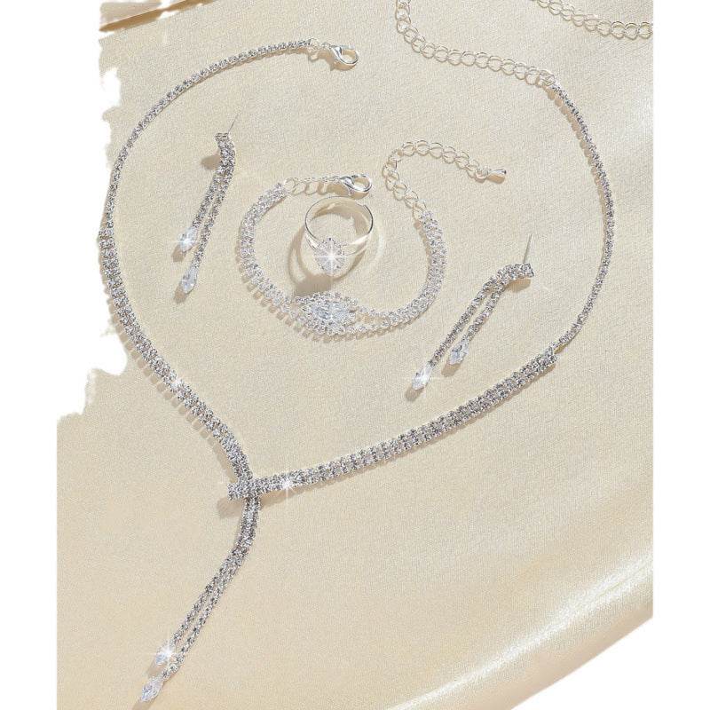 Elegant Four-Piece Bridal Jewelry Set - Necklace, Earrings & Bracelet - Buy Center